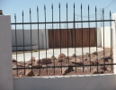 simple view fencing arched by the pickets