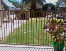 simple view fencing on a masonry pony wall